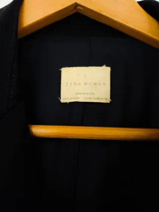 Americana con Cinturón. Limpia de tintorería.