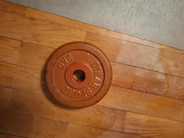 Banco de gimnasio con pesas