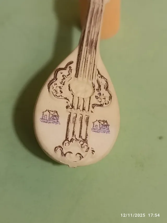 Gommina vintage a forma di mandolino