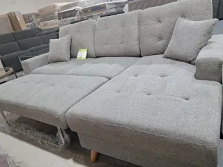 Sofá cama modular gris con almacenaje