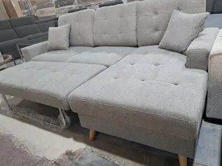 Sofá cama modular gris con almacenaje