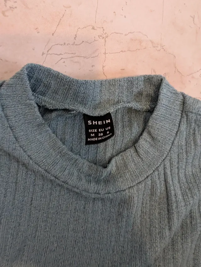 Camiseta sin mangas cuello alto