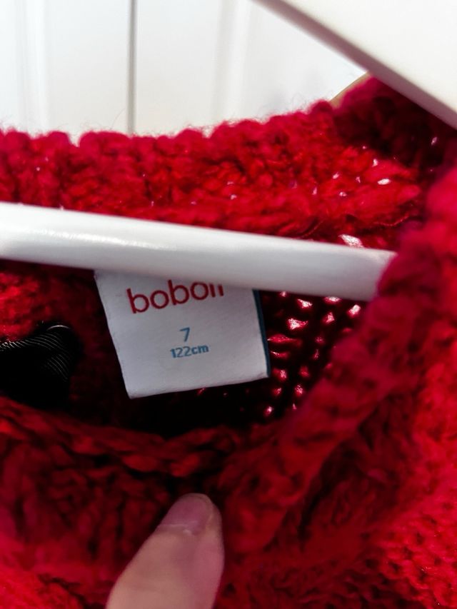 Jersey rojo tejido trenzado