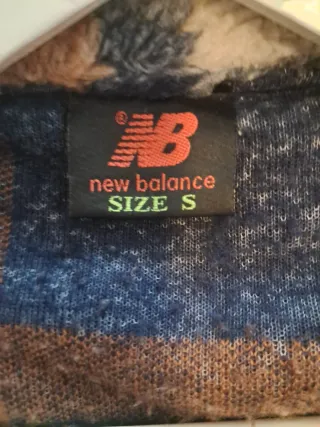 Chaqueta New Balance cuadros polar.