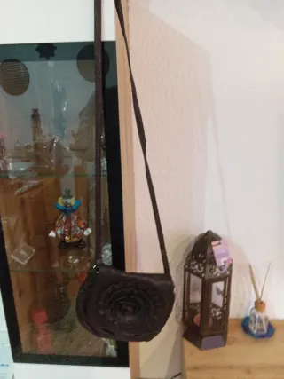 Bolso de mano con flor