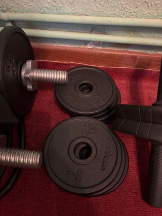 Set de pesas y accesorios gimnasio