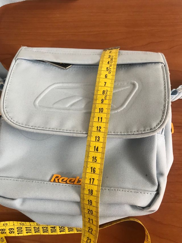 Bolso bandolera Reebok azul y naranja