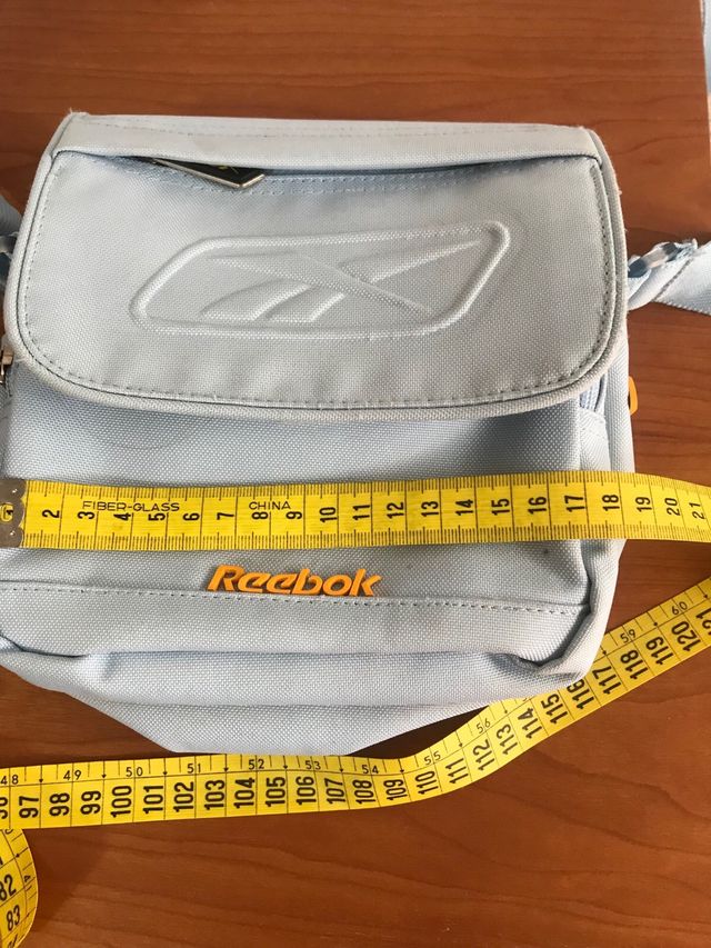 Bolso bandolera Reebok azul y naranja