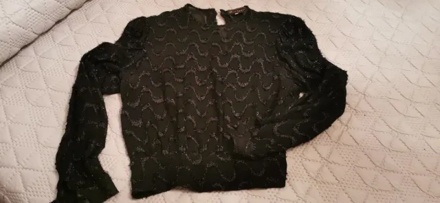 Blusa fiesta negra con brillo