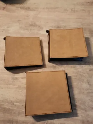 3 cajas de fundas de piel para CD
