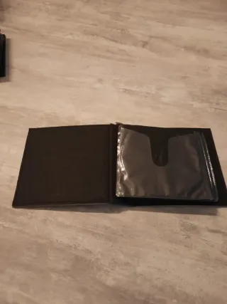 3 cajas de fundas de piel para CD