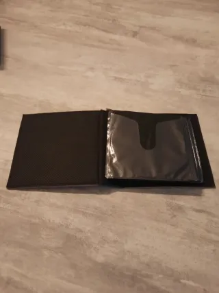 3 cajas de fundas de piel para CD