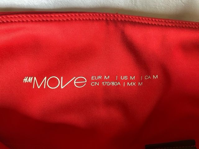 Pantalón ciclista H&M rojo con bolsillo lateral