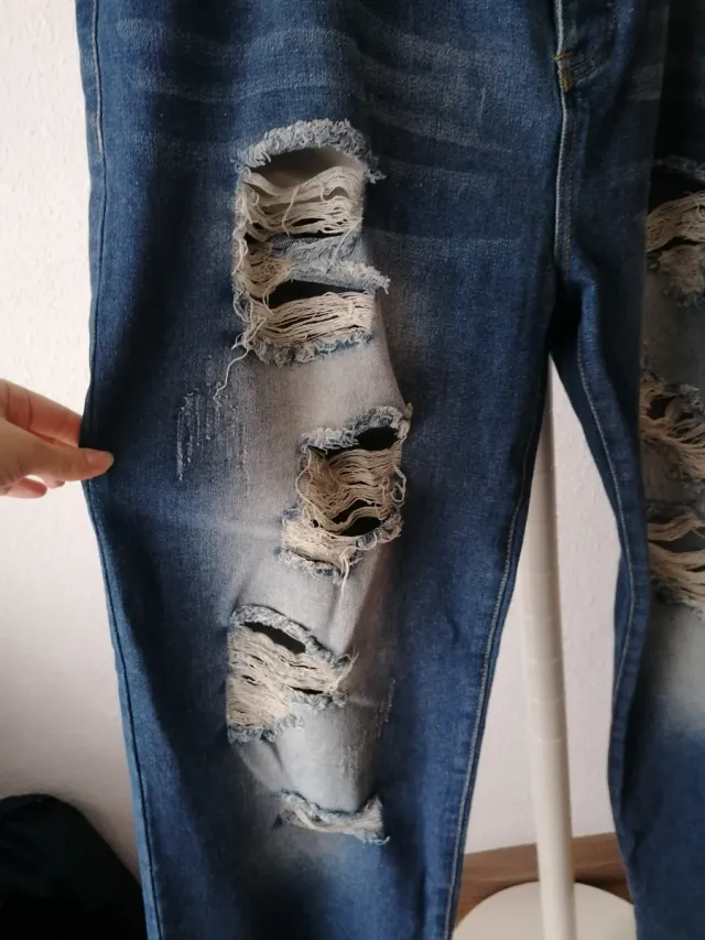 Vaqueros rotos talla 48 / XXL