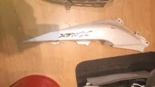 Cacha lateral izquierda Yamaha XMAX 125/300