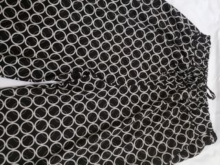 Pantaloni larghi fantasia cerchi