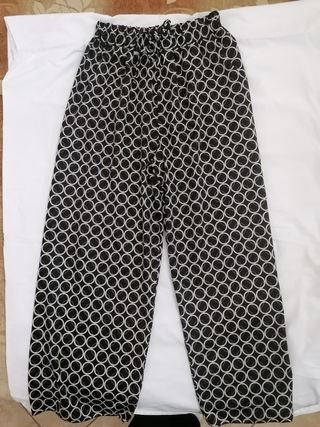 Pantaloni larghi fantasia cerchi