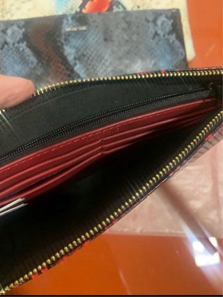 Carteras de mano efecto piel serpiente