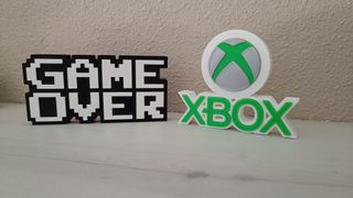 Segni 3D fanart di videogiochi come Xbox o Game Over in plastica stampata 3D