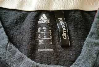 Camisa deportiva Adidas negra