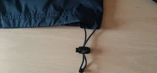 Cortavientos Reebok Unisex azul marino con capucha