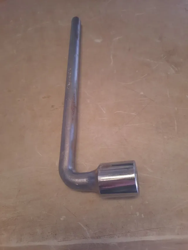 Llave codo Palmera 27