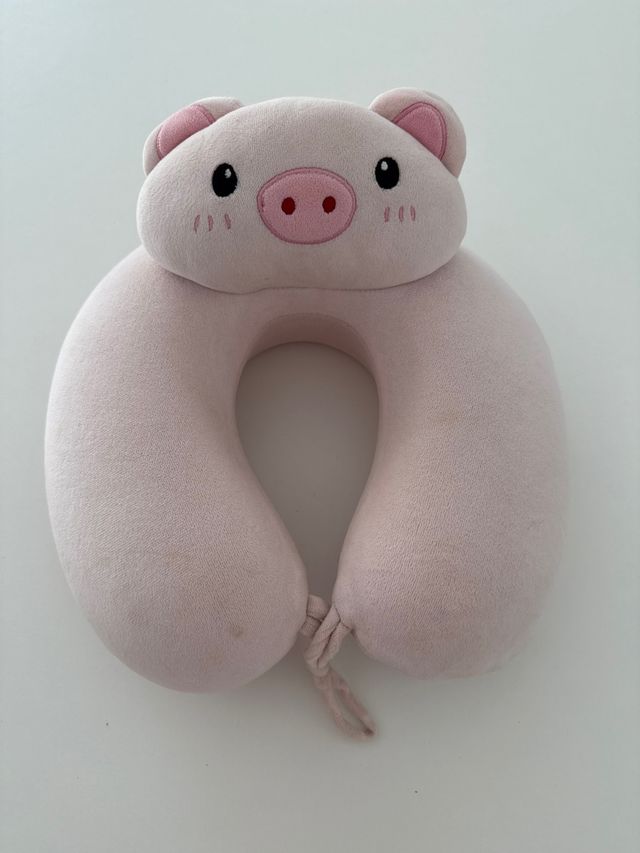 Almohada de viaje de peluche rosa