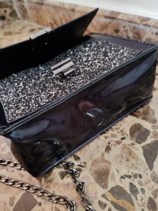 Bolso bandolera negro y dorado