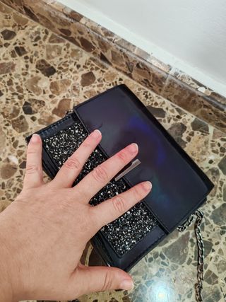 Bolso bandolera negro y dorado