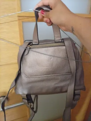 Mochila pequeña dorada/plateada