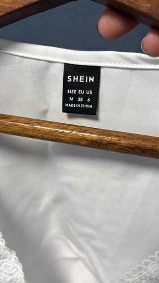 Blusa blanca manga larga con fruncido