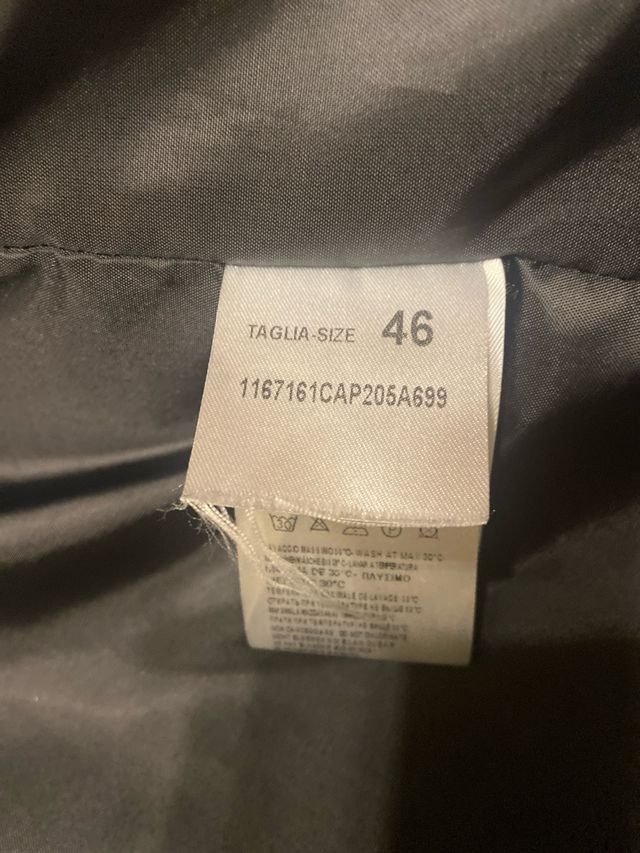 Pelliccia ecologica con cappuccio