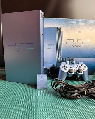 PlayStation 2 PAL + Mando + Memory Edición Aqua