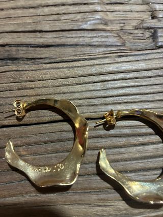 Conjunto Uno de 50: Pendientes y Brazalete