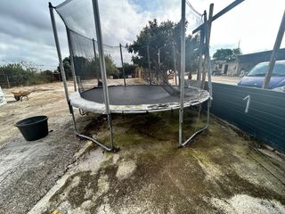 Cama elástica con red de seguridad