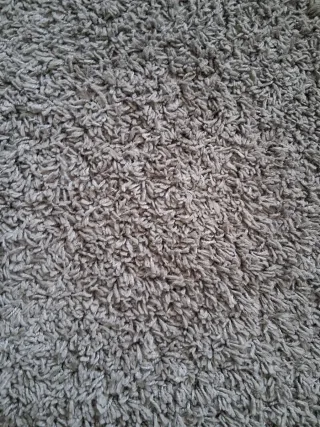 Tappeto rotondo pelo lungo grigio