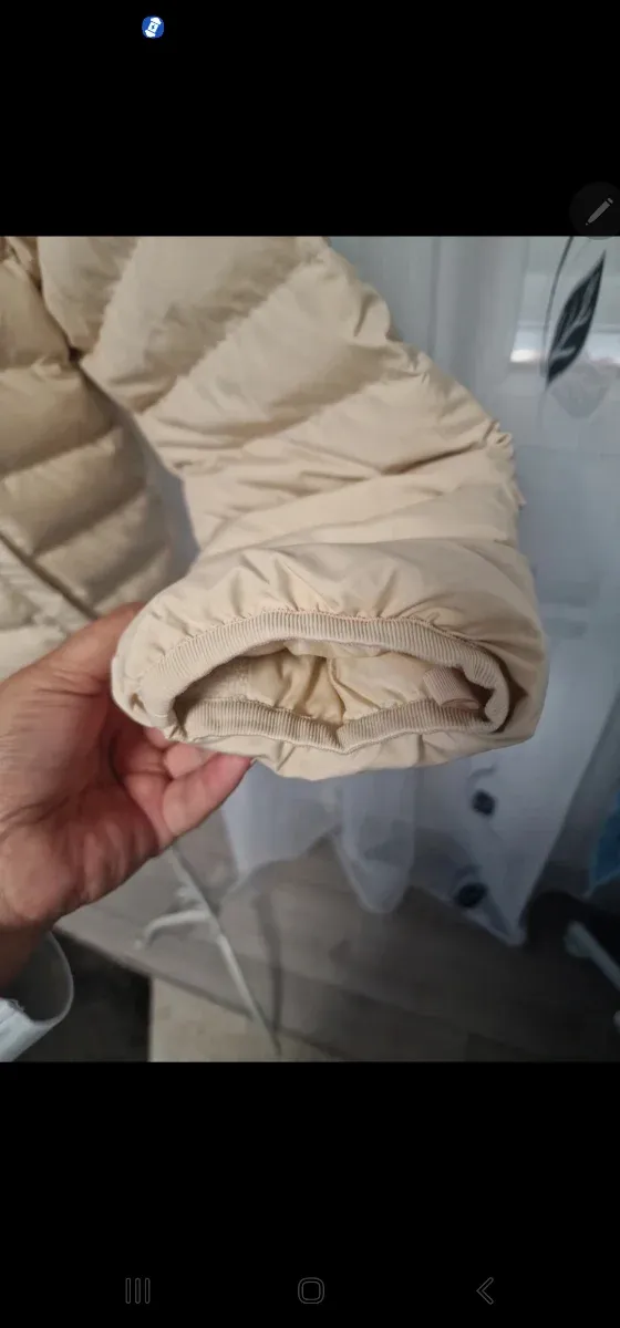 Abrigo Nike acolchado beige