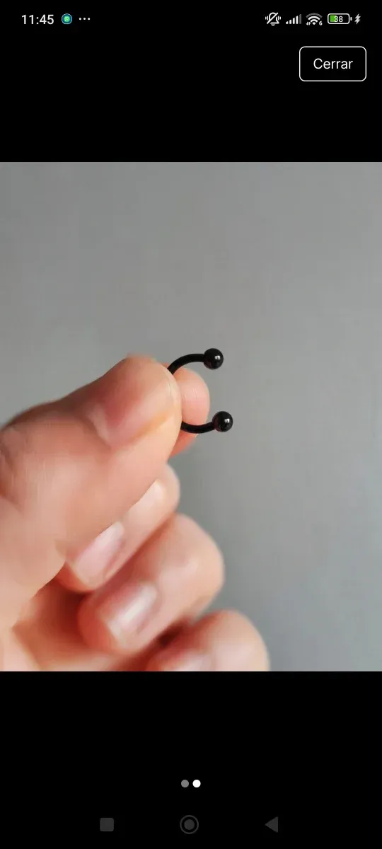 Piercing negro con bolas