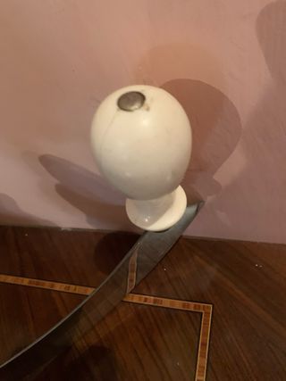 Coltello mezzaluna doppio manico