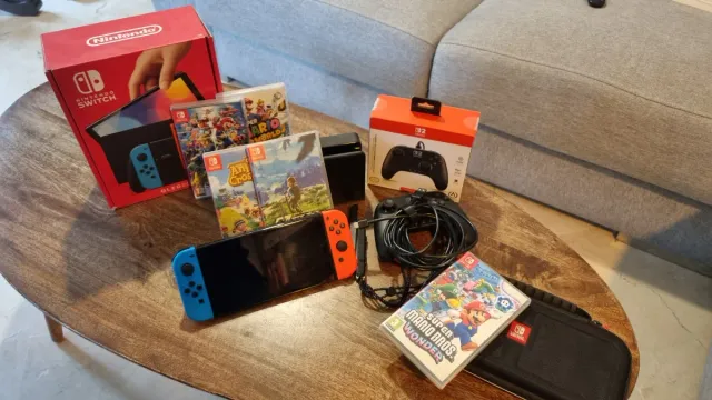 Nintendo Switch OLED + 5 Juegos y Accesorios