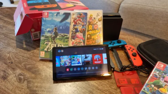 Nintendo Switch OLED + 5 Juegos y Accesorios
