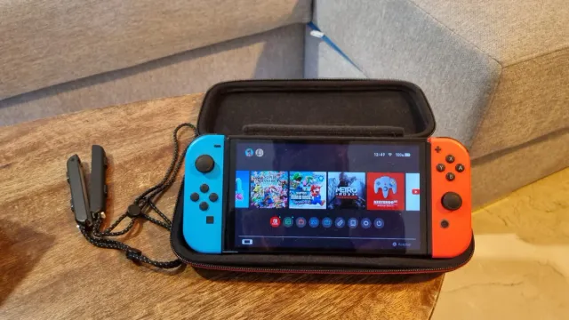 Nintendo Switch OLED + 5 Juegos y Accesorios