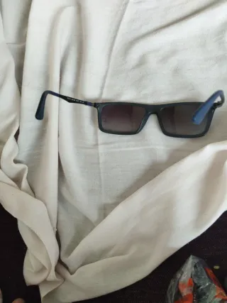 Gafas de sol Ray-Ban negras y grises