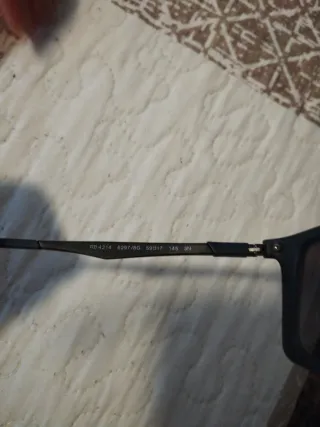 Gafas de sol Ray-Ban negras y grises