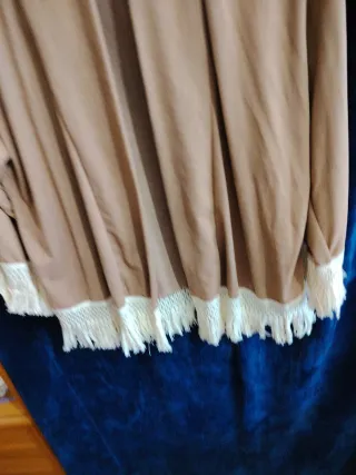 Chaquetilla beige con flecos