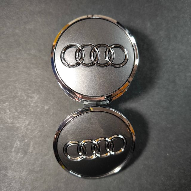 TAPABUJES AUDI 61mm PLATA - EMBLEMA LLANTAS AUDI