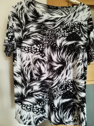 Jersey fiesta Hong Yu negro y blanco Talla L.