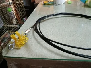Cable con cepillo para chimenea