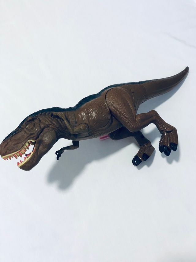 Dinosauro giocattolo interattivo marrone e nero