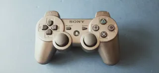 2 mandos PS3 Sony plata oscuro  metalizado + azul